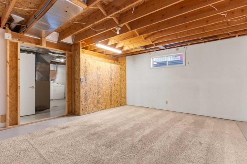 2 West Barrett Place, Cochrane, AB - Indoor Photo Showing Basement