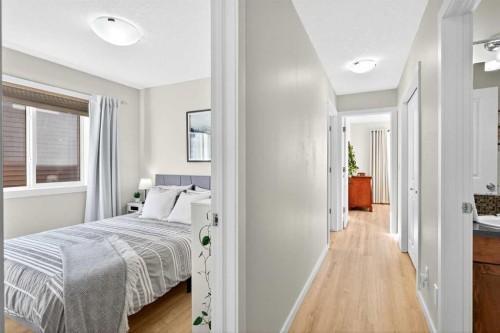 1346 Kings Heights Way Se, Airdrie, AB - Indoor Photo Showing Bedroom