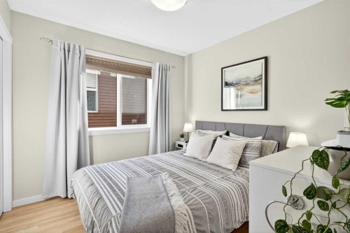 1346 Kings Heights Way Se, Airdrie, AB - Indoor Photo Showing Bedroom