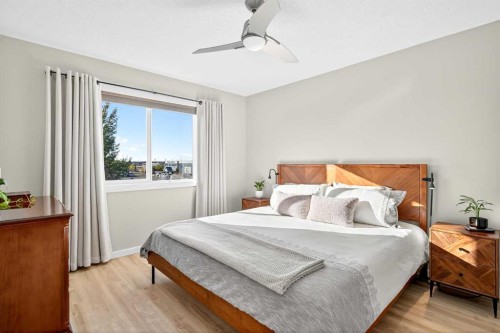 1346 Kings Heights Way Se, Airdrie, AB - Indoor Photo Showing Bedroom