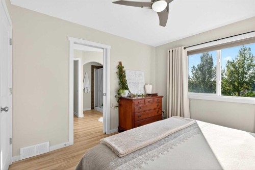 1346 Kings Heights Way Se, Airdrie, AB - Indoor Photo Showing Bedroom