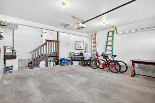 1346 Kings Heights Way Se, Airdrie, AB - Indoor Photo Showing Garage