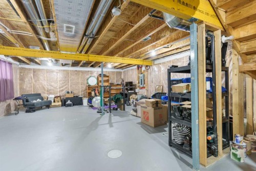 1346 Kings Heights Way Se, Airdrie, AB - Indoor Photo Showing Basement