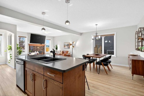 1346 Kings Heights Way Se, Airdrie, AB - Indoor Photo Showing Kitchen With Double Sink