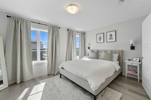 102-474 Seton Circle Se, Calgary, AB - Indoor Photo Showing Bedroom