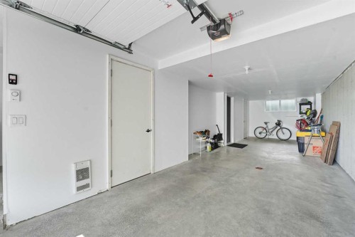 102-474 Seton Circle Se, Calgary, AB - Indoor Photo Showing Garage