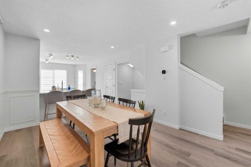 102-474 Seton Circle Se, Calgary, AB - Indoor Photo Showing Dining Room