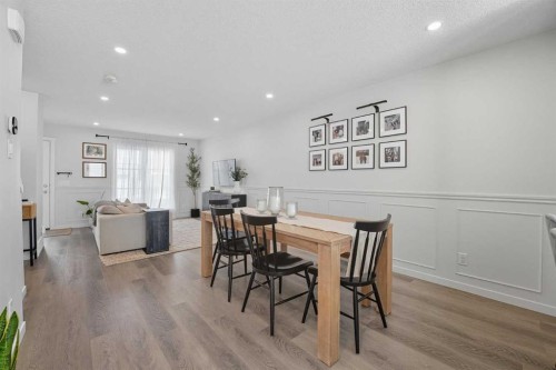 102-474 Seton Circle Se, Calgary, AB - Indoor Photo Showing Dining Room