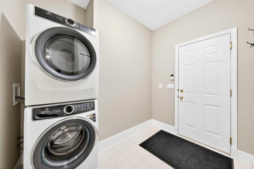80 Sierra Morena Landing Sw, Calgary, AB - Indoor Photo Showing Laundry Room