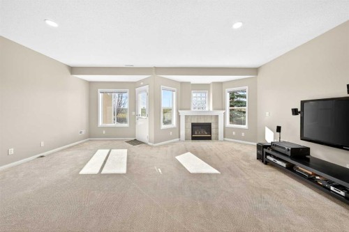80 Sierra Morena Landing Sw, Calgary, AB - Indoor With Fireplace