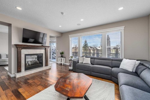 151 Auburn Sound Circle Se, Calgary, AB - Indoor Photo Showing Living Room With Fireplace