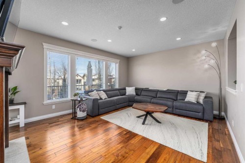 151 Auburn Sound Circle Se, Calgary, AB - Indoor Photo Showing Living Room