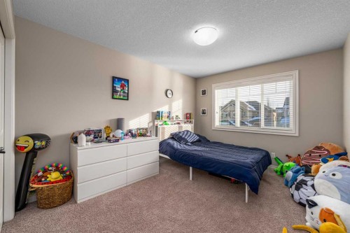 151 Auburn Sound Circle Se, Calgary, AB - Indoor Photo Showing Bedroom