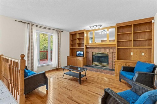 1024 Santana Road Nw, Calgary, AB - Indoor Photo Showing Living Room With Fireplace