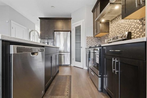 36 Howse Drive Ne, Calgary, AB - Indoor Photo Showing Kitchen With Stainless Steel Kitchen With Upgraded Kitchen