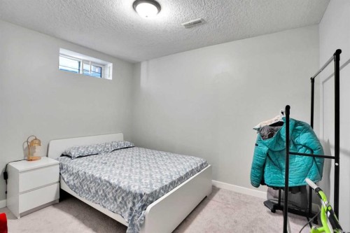 5 Coville Gardens Ne, Calgary, AB - Indoor Photo Showing Bedroom