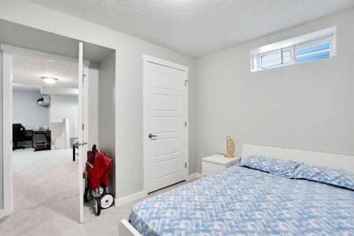 5 Coville Gardens Ne, Calgary, AB - Indoor Photo Showing Bedroom