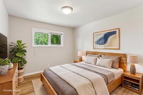 439 Hendon Drive Nw, Calgary, AB - Indoor Photo Showing Bedroom