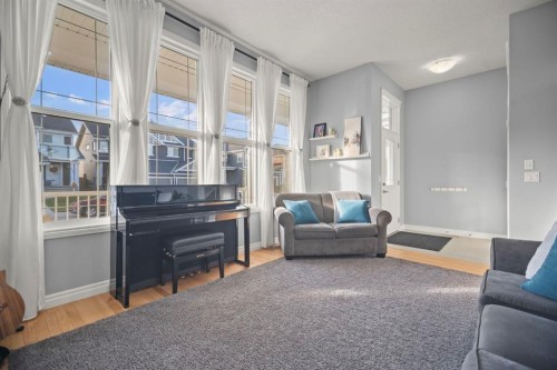 411 River Heights Crescent, Cochrane, AB - Indoor Photo Showing Living Room
