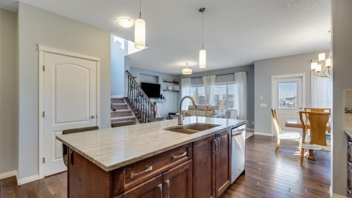 343 Hillcrest Heights Sw, Airdrie, AB - Indoor Photo Showing Kitchen With Double Sink