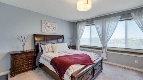 343 Hillcrest Heights Sw, Airdrie, AB - Indoor Photo Showing Bedroom