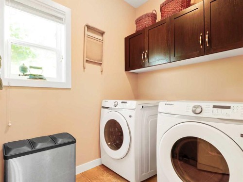 50 Elgin Meadows Green Se, Calgary, AB - Indoor Photo Showing Laundry Room