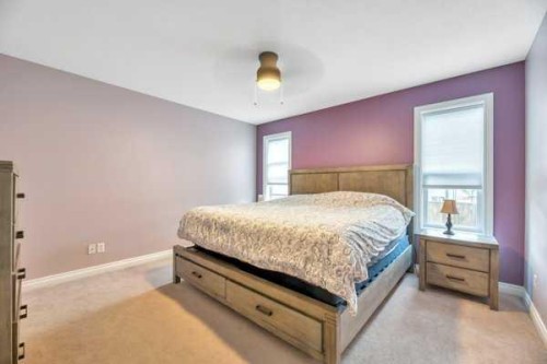 196 Camden Place, Strathmore, AB - Indoor Photo Showing Bedroom