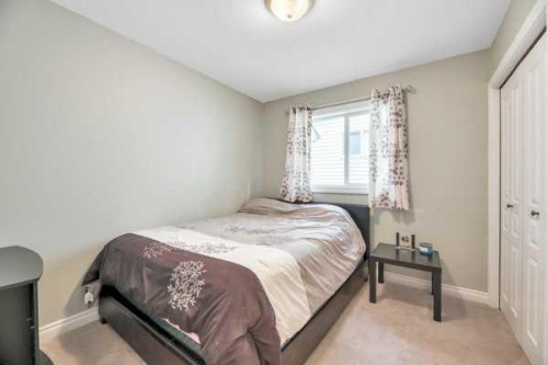 196 Camden Place, Strathmore, AB - Indoor Photo Showing Bedroom