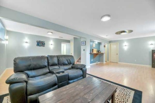 196 Camden Place, Strathmore, AB - Indoor Photo Showing Living Room