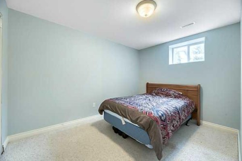 196 Camden Place, Strathmore, AB - Indoor Photo Showing Bedroom
