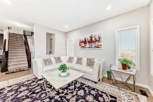 28 Panton Court Nw, Calgary, AB - Indoor Photo Showing Living Room