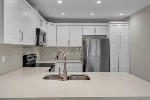 309 Cityscape Court Ne, Calgary, AB - Indoor Photo Showing Kitchen With Double Sink With Upgraded Kitchen