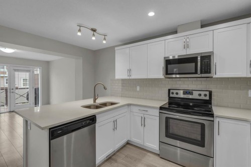 309 Cityscape Court Ne, Calgary, AB - Indoor Photo Showing Kitchen With Double Sink