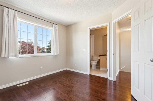 73 Rocky Ridge Heath Nw, Calgary, AB - Indoor Photo Showing Other Room