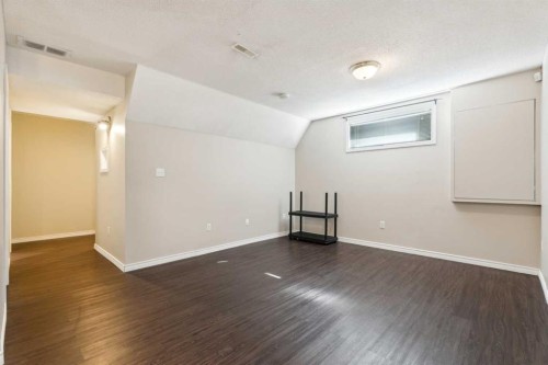 73 Rocky Ridge Heath Nw, Calgary, AB - Indoor Photo Showing Other Room