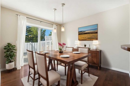 73 Rocky Ridge Heath Nw, Calgary, AB - Indoor Photo Showing Dining Room