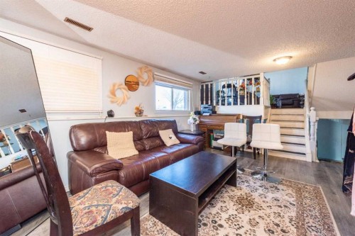 304 Whitefield Drive Ne, Calgary, AB - Indoor Photo Showing Living Room