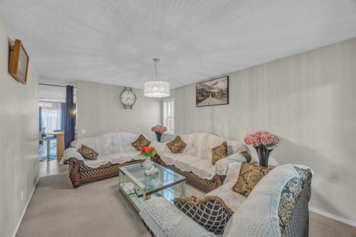 814 Copperfield Boulevard Se, Calgary, AB - Indoor Photo Showing Living Room