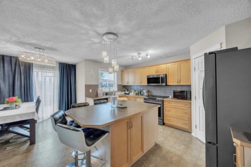 814 Copperfield Boulevard Se, Calgary, AB - Indoor Photo Showing Kitchen With Double Sink