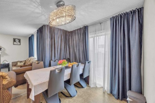 814 Copperfield Boulevard Se, Calgary, AB - Indoor Photo Showing Dining Room