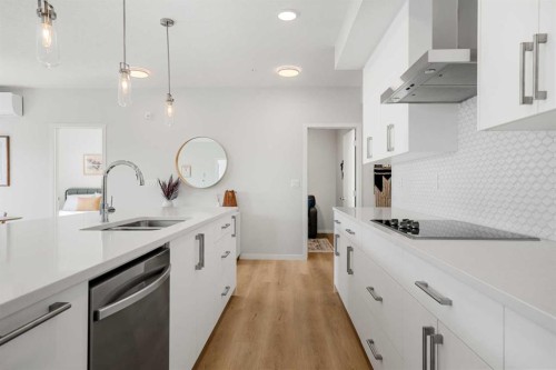 4113-550 Belmont Street, Calgary, AB - Indoor Photo Showing Kitchen With Double Sink With Upgraded Kitchen