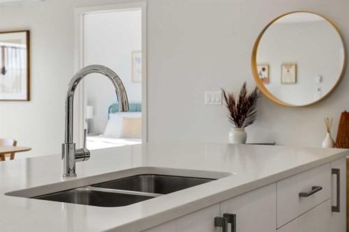 4113-550 Belmont Street, Calgary, AB - Indoor Photo Showing Kitchen With Double Sink