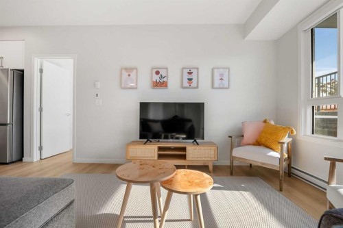 4113-550 Belmont Street, Calgary, AB - Indoor Photo Showing Living Room