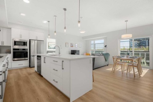 4113-550 Belmont Street, Calgary, AB - Indoor Photo Showing Kitchen With Stainless Steel Kitchen With Upgraded Kitchen
