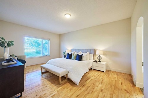 250 Strathridge Place Sw, Calgary, AB - Indoor Photo Showing Bedroom