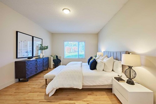 250 Strathridge Place Sw, Calgary, AB - Indoor Photo Showing Bedroom