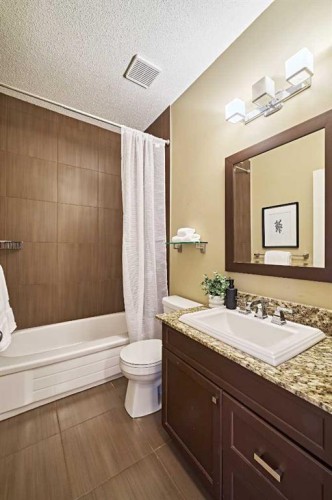 250 Strathridge Place Sw, Calgary, AB - Indoor Photo Showing Bathroom