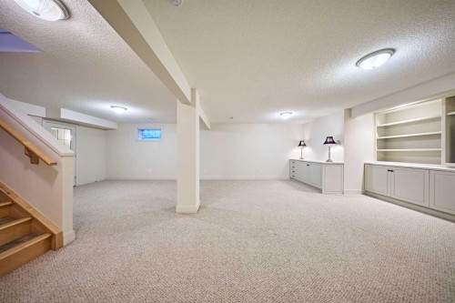 250 Strathridge Place Sw, Calgary, AB - Indoor Photo Showing Basement