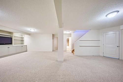 250 Strathridge Place Sw, Calgary, AB - Indoor Photo Showing Other Room