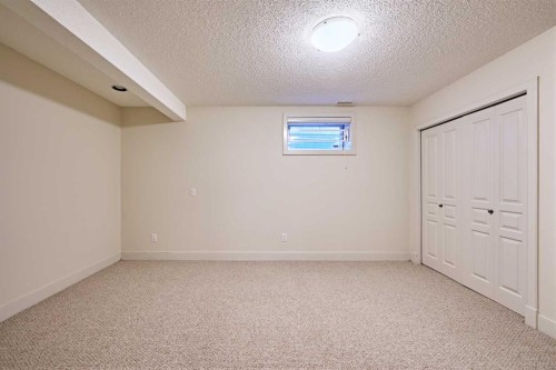 250 Strathridge Place Sw, Calgary, AB - Indoor Photo Showing Other Room